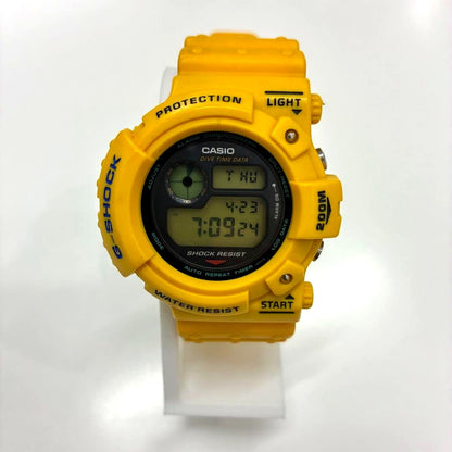 Casio G-Shock FROGMAN DW-6300-9 vintage watch with yellow and gray accents, asymmetric case design