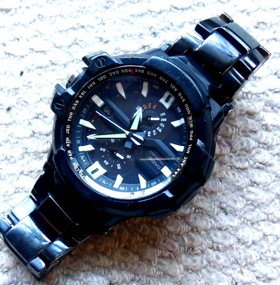 Casio G-Shock Skycircuit GW-A1000 solar radio wave watch with black metal band and cockpit-inspired design
