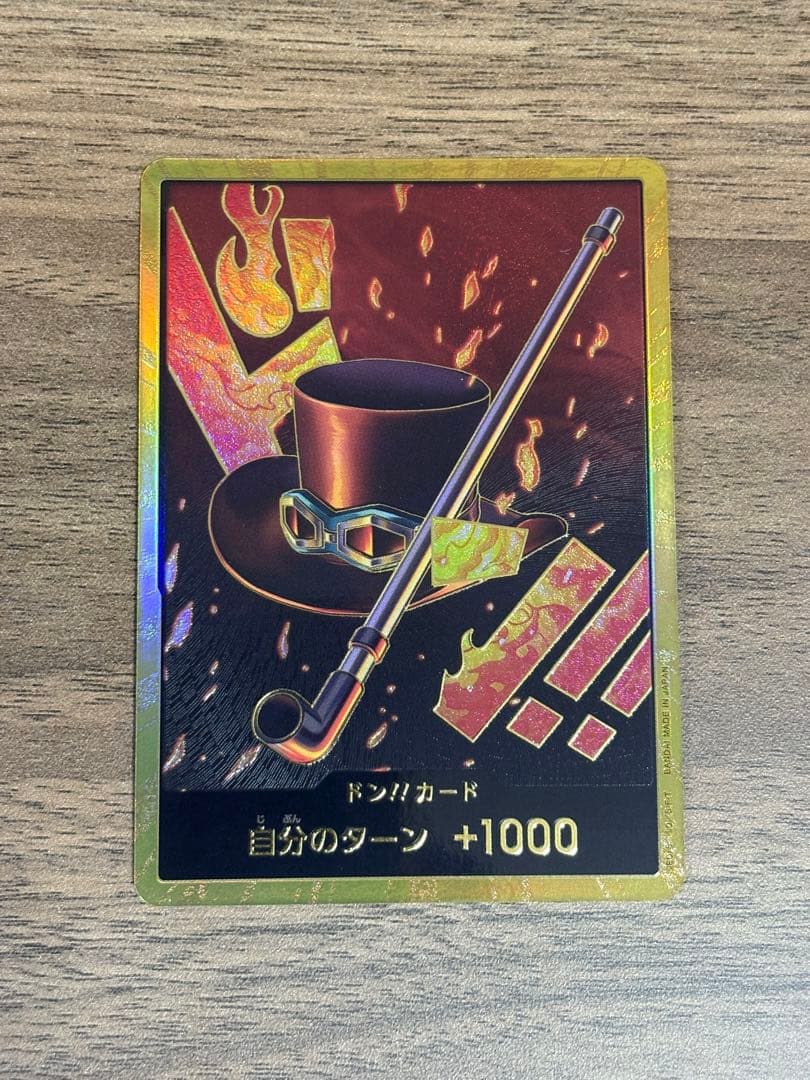 One Piece Sabo Gold Don Super Parallel trading card from Japan with detailed artwork and rarity features