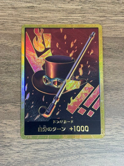 One Piece Sabo Gold Don Super Parallel trading card from Japan with detailed artwork and rarity features
