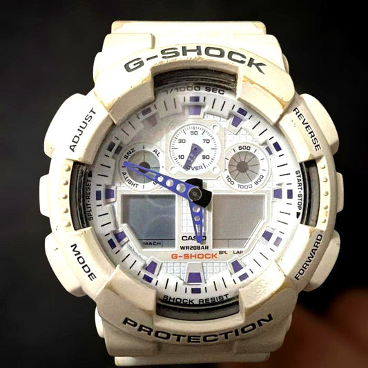 Casio G-Shock GA-100A white shockproof quartz watch with resin band and stainless steel case