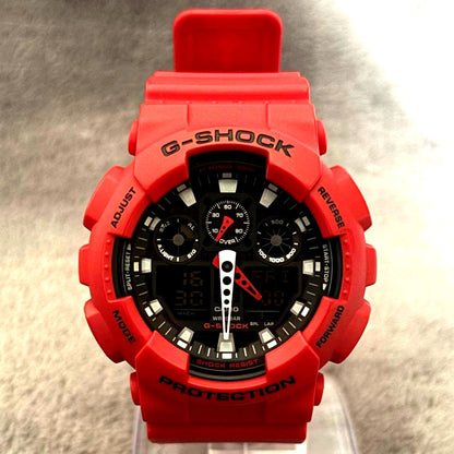 Casio G-Shock GA-100B-4AJF red analog digital watch with shock resistance and 20 bar water resistance