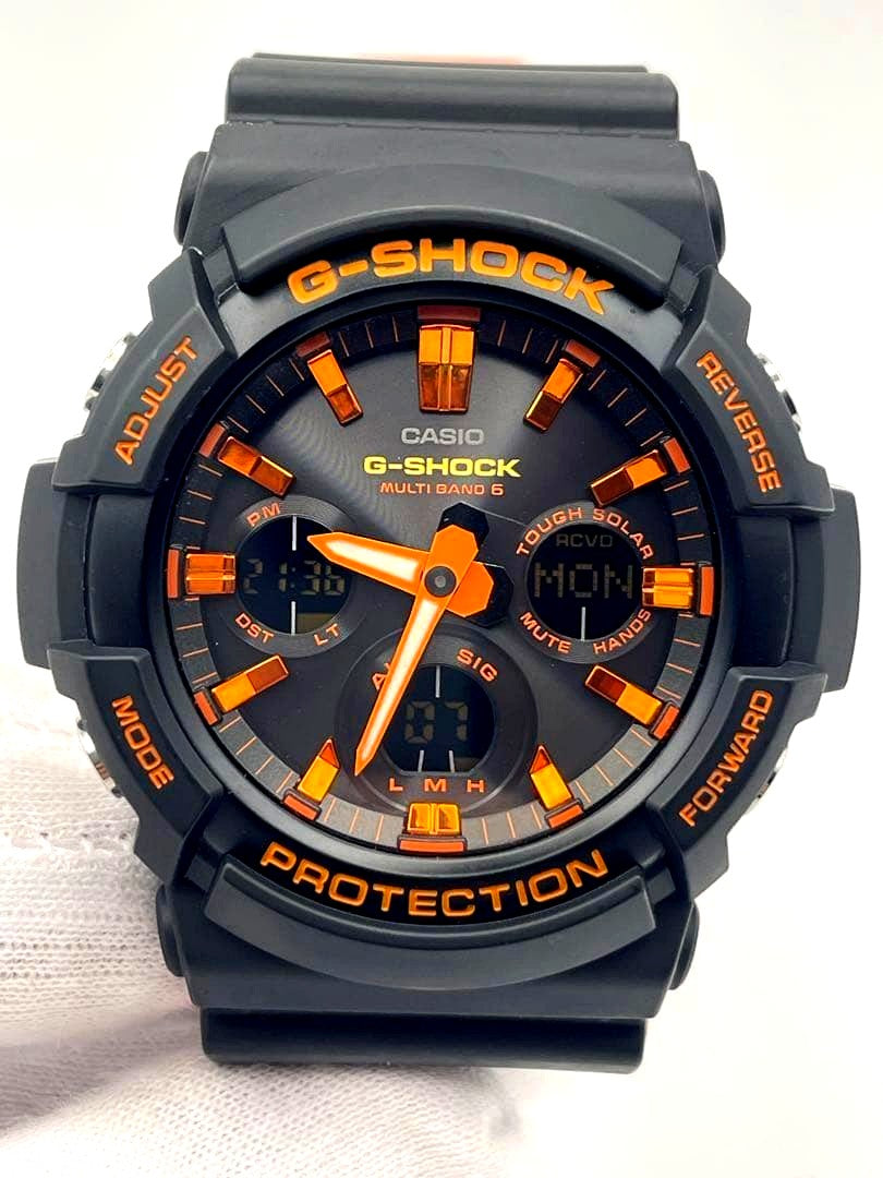 Casio G-Shock GAW-100BR-1AJF orange and black digital quartz wristwatch with durable resin band