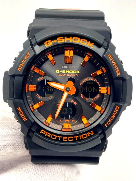Casio G-Shock GAW-100BR-1AJF orange and black digital quartz wristwatch with durable resin band