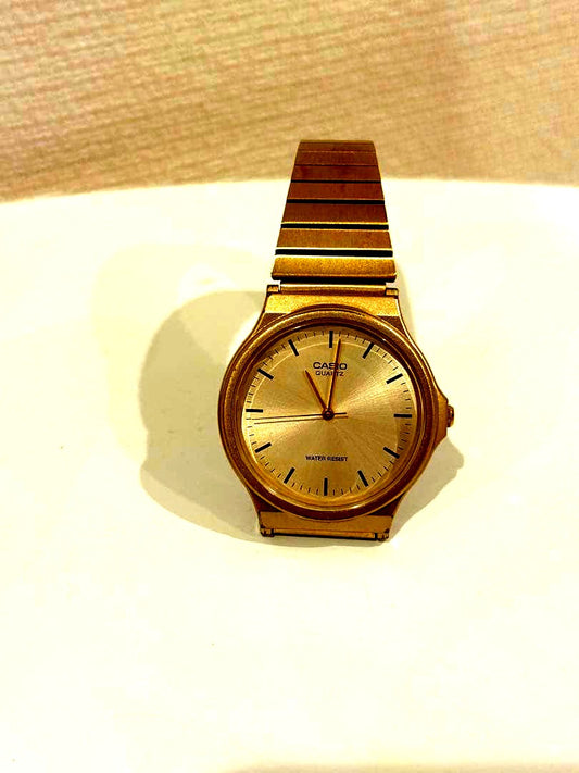 Casio Gold Analog Watch MQ-24G-9EJH with silver dial and gold metal band Japan import
