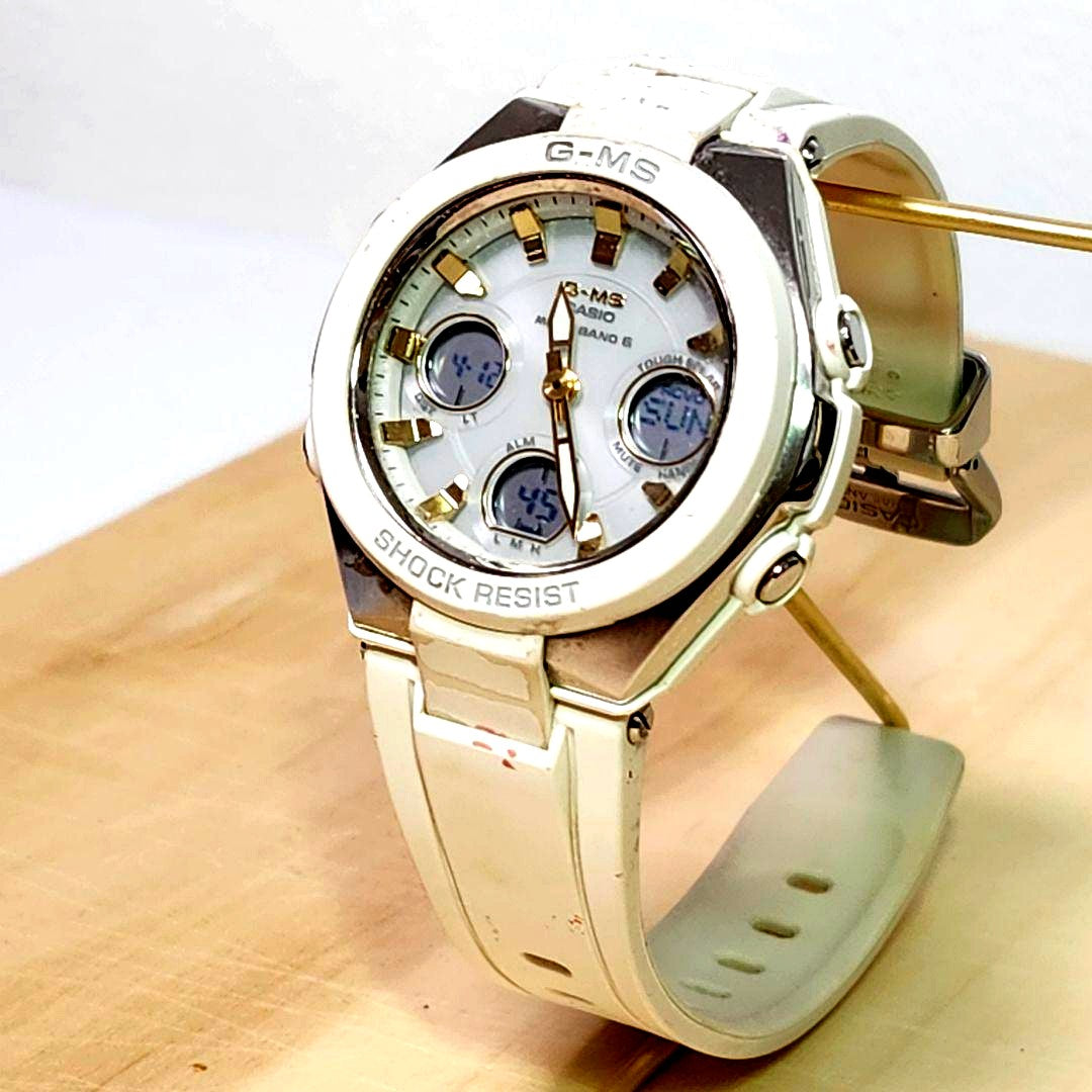 Casio G-MS Series MGS-W100 women's white gold solar-powered radio wave watch with analog-digital display