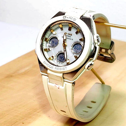 Casio G-MS Series MGS-W100 women's white gold solar-powered radio wave watch with analog-digital display