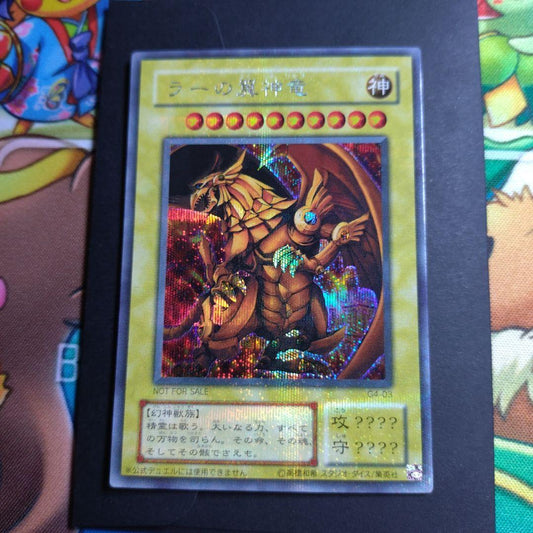 Ultra rare Yu-Gi-Oh The Winged Dragon of Ra G4-03 trading card with divine attribute and Phantom Beast race