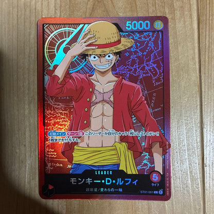 One Piece Monkey D Luffy ST01-001 anime illustration card with hologram effects in protective sleeves