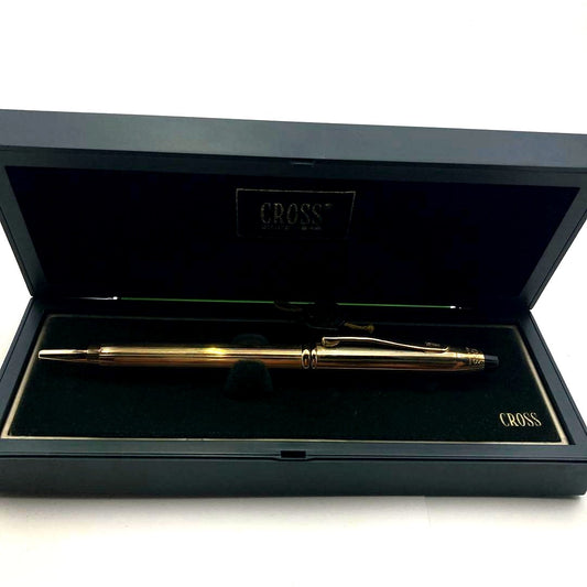 Casio Gold Ballpoint Pen in gold color with minimal signs of use, displayed on a white background