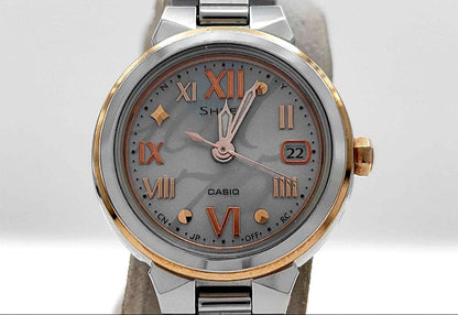 Casio Sheen women's solar watch SHW-1508 with silver dial, pink gold accents, date display, and Roman numeral markers