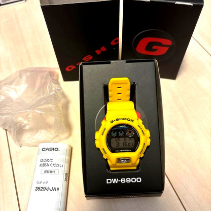 Casio G-Shock DW-6900 digital watch with yellow body and backlight, Japan import