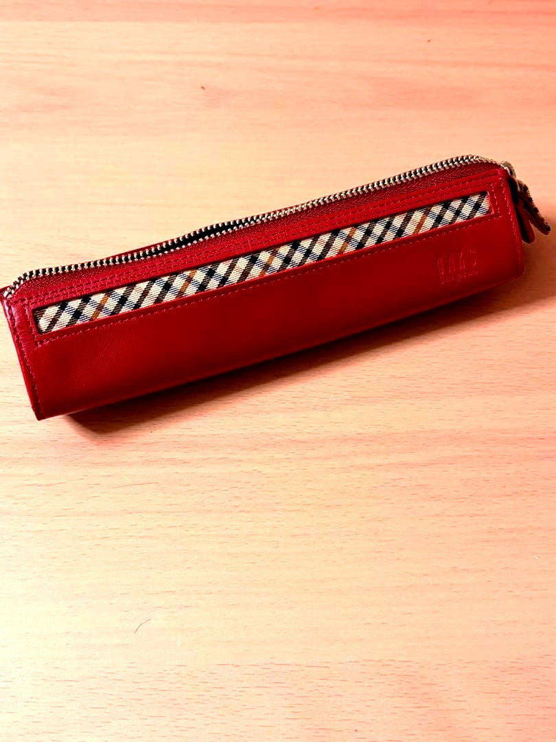 Red Daks House Check Cross Line pen case in excellent condition with no scratches or stains
