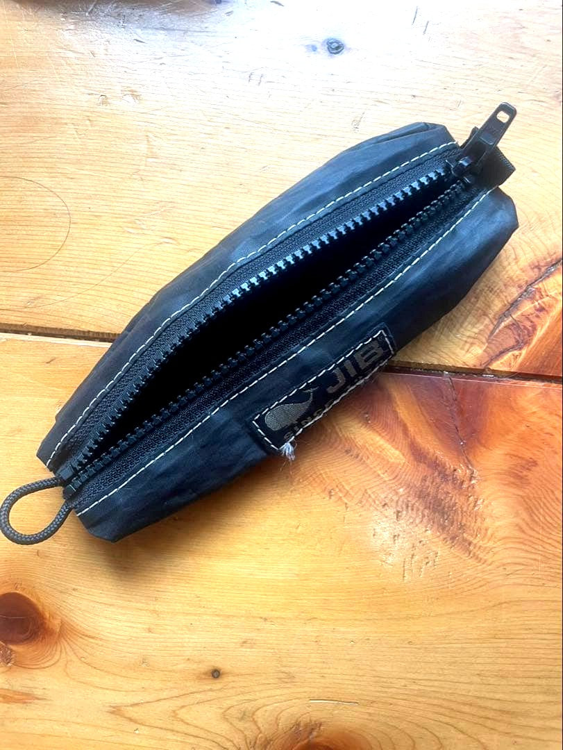 JIB pen case made of black durable sailcloth material with zipper closure