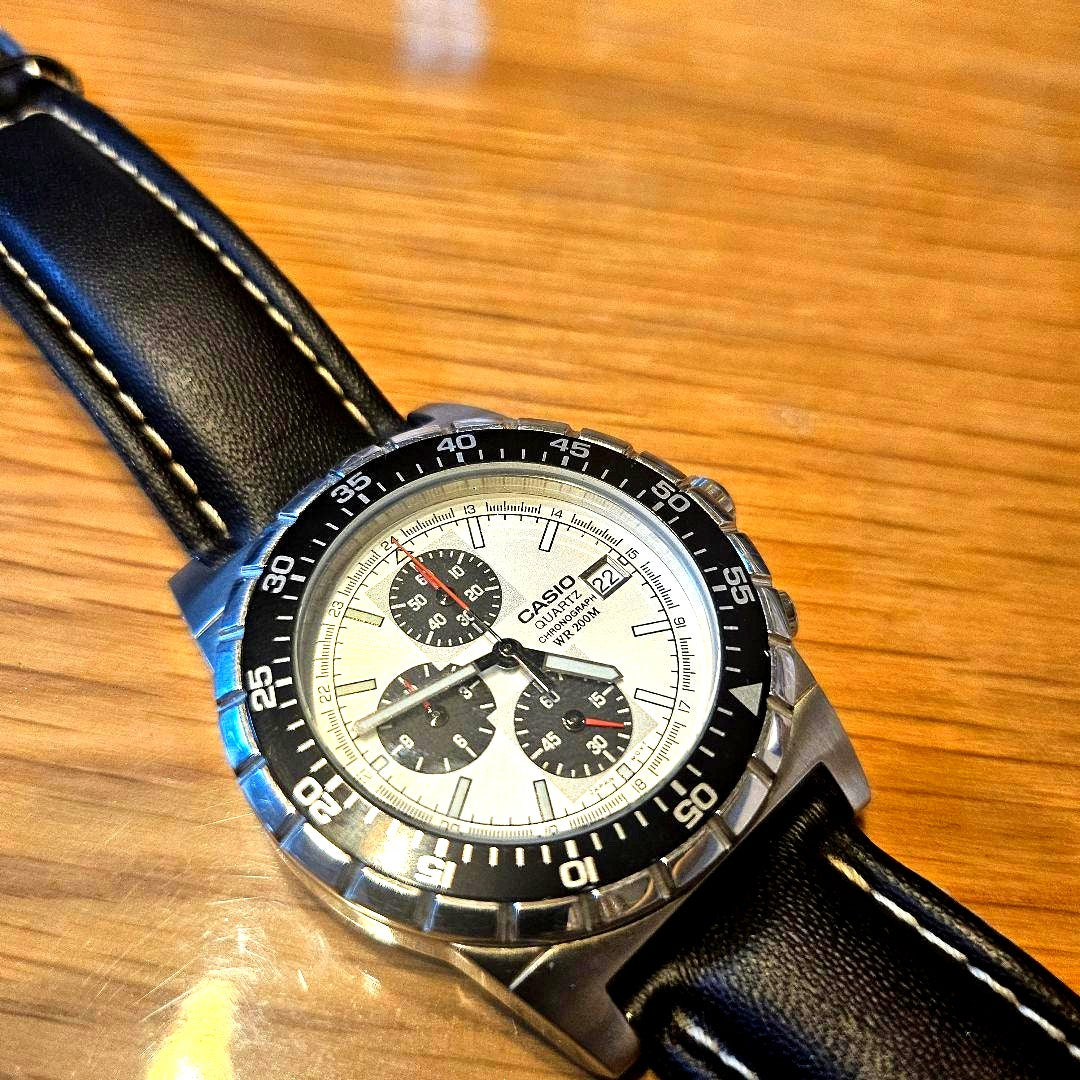 Casio MSY-500 Quartz Chronograph watch with black dial, stainless steel case, and leather strap