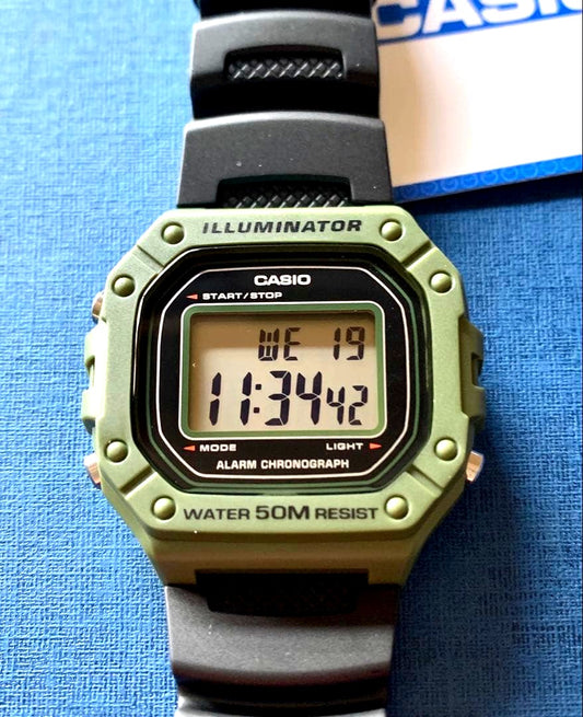 Casio digital watch retro model showing time display with water resistance and quartz stopwatch features