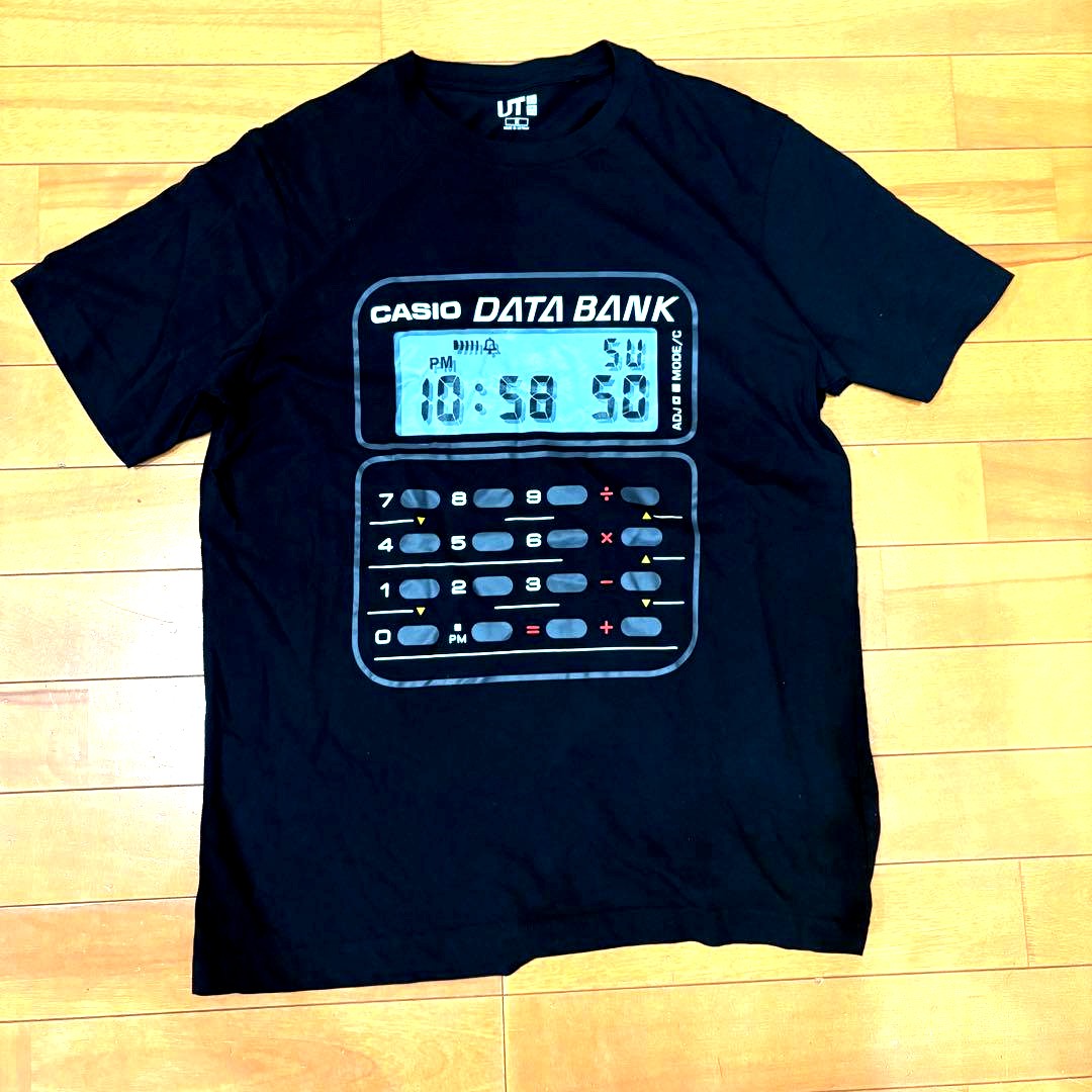 Oversized black Casio Data Bank print t-shirt with bold digital watch design front view
