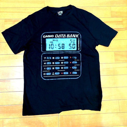 Oversized black Casio Data Bank print t-shirt with bold digital watch design front view