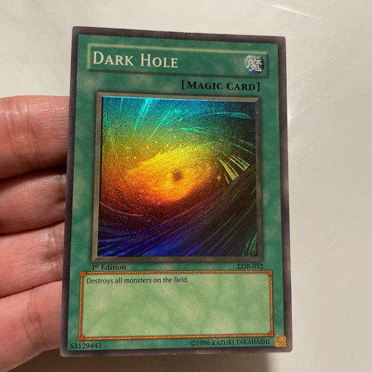 Yugioh Black Hole LOB-052 North America 1st Edition card with misaligned border in English