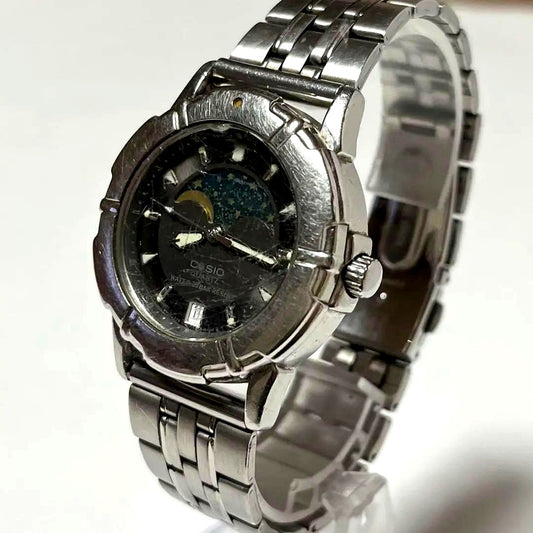 Casio Moon Phase Diver Watch model with replaced battery showing scratched crystal and faded bezel markings