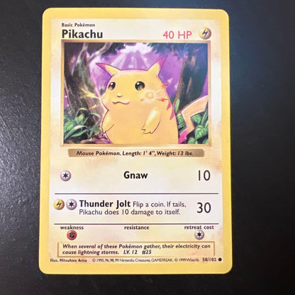 Vintage Pokemon Pikachu card 58/102 English version with minor scratches and whitening on back
