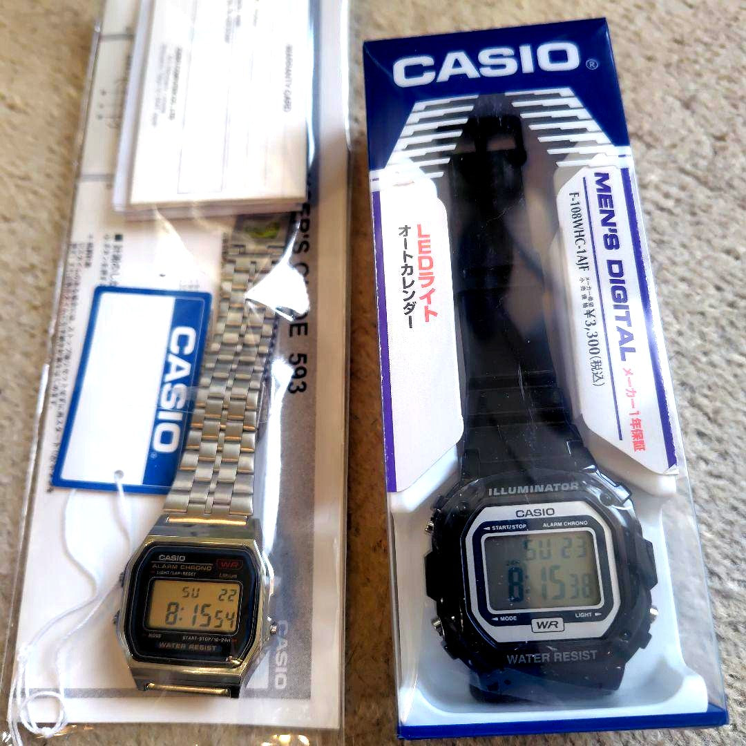 Casio F108 and A159 two-piece watch set with protective films, showing digital watch faces and metal bands.