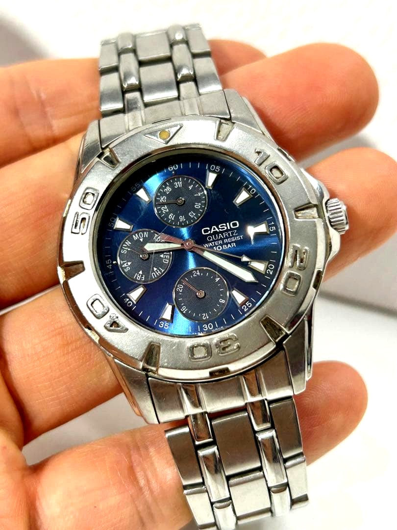 Casio MYD-1047 wristwatch with visible wear and scratches, battery replaced in 2026, Japan import