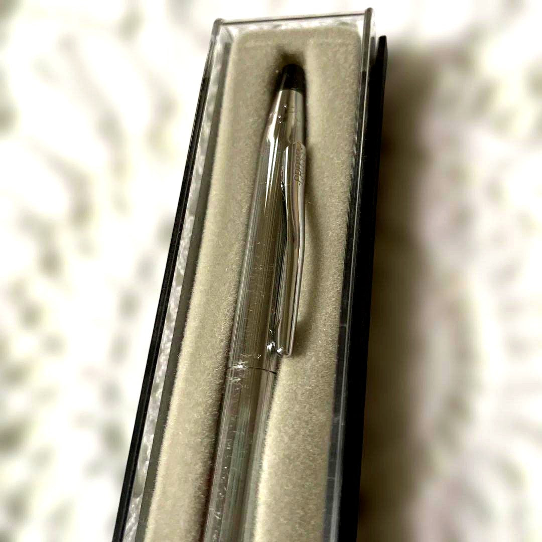 Cross silver ballpoint pen with classic design alongside matching silver case imported from Japan