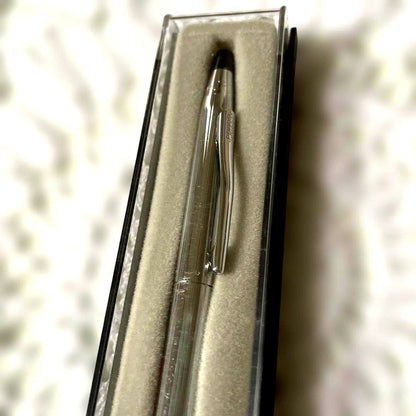 Cross silver ballpoint pen with classic design alongside matching silver case imported from Japan