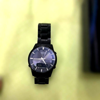 Casio Linage LCW-M170 watch with black dial and solar power, radio-controlled, shown with accessories