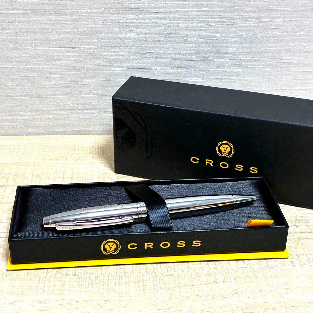 Cross brand silver ballpoint pen with matching case displayed on white background