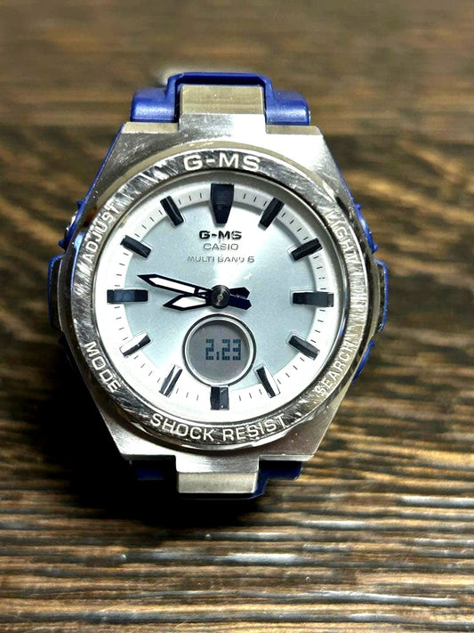 Casio G-MS MSG-W200-2AJF digital wristwatch with silver bezel and navy band