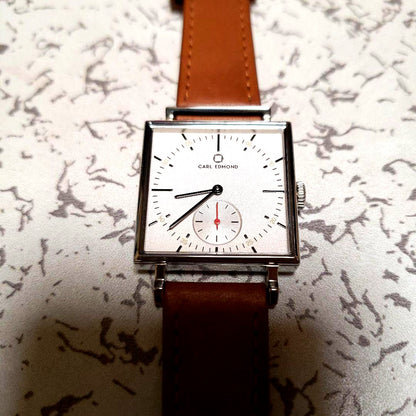 Casio Carl Edmond unisex quartz watch with silver square dial and brown leather band