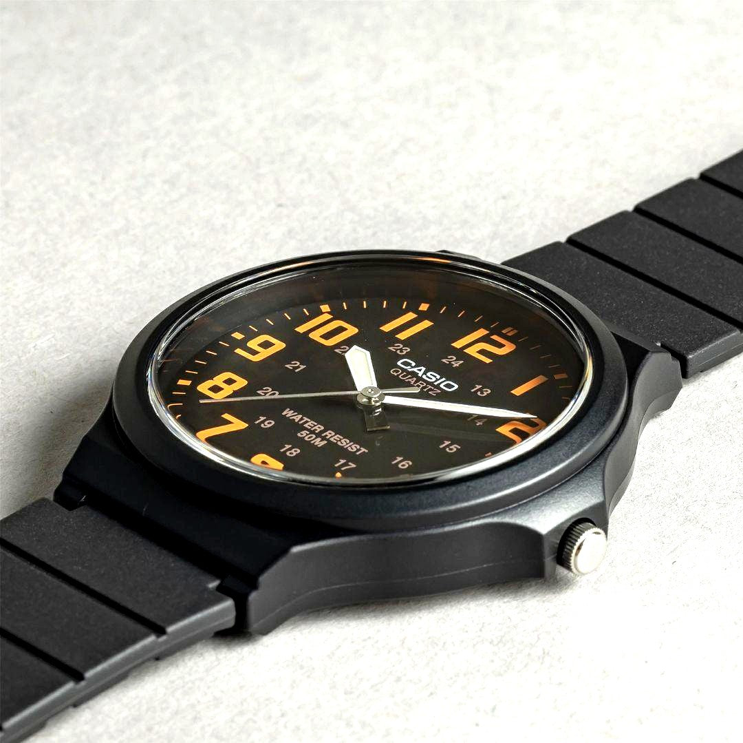 Casio Collection Standard MW-240-4B analog watch with orange dial and black resin band