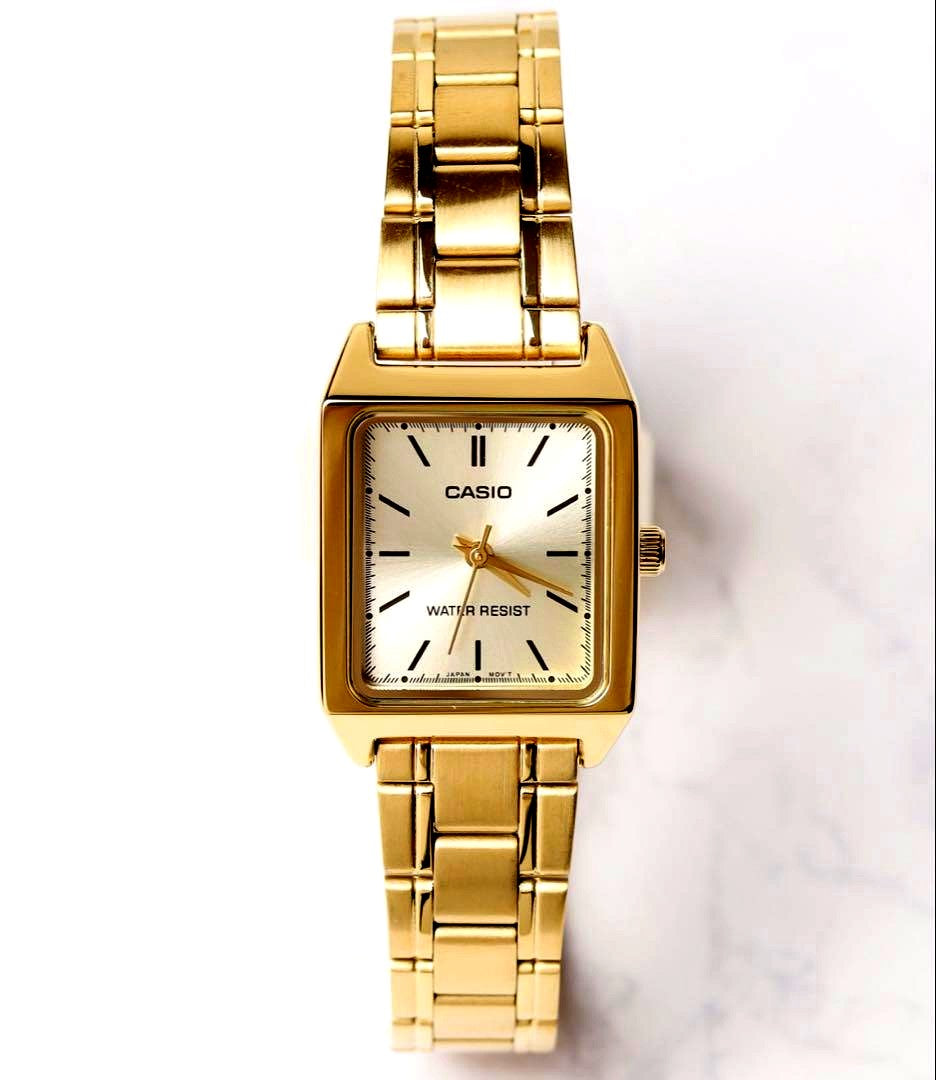 Casio LTP-V007G-9E ladies gold quartz watch with gold metal band, showing watch face and bracelet