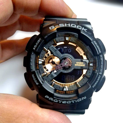 Casio G-Shock GA-110RG black and gold analog digital watch with shock resistant design