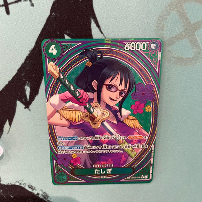 One Piece Tashigi SP EB03-018 collectible card displayed in protective sleeve