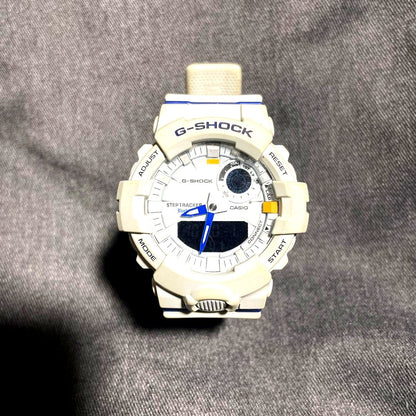 Casio G-Shock GBA-800DG-7AJF quartz watch with white body, blue accents, and resin band