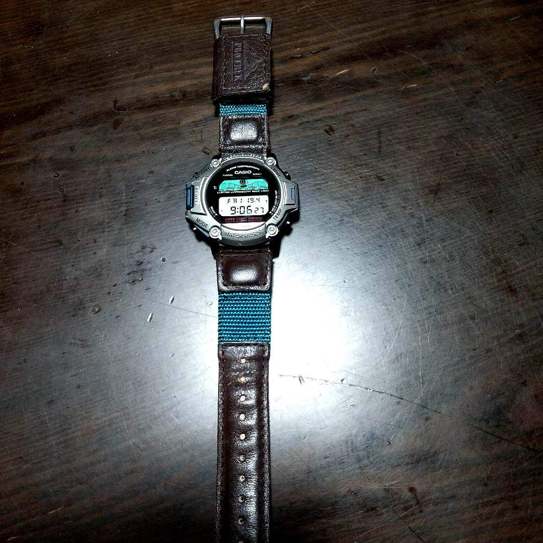 Used Casio watch showing classic design with replaced battery, slight wear visible on case and strap