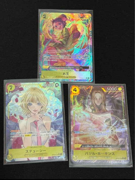 One Piece Card Game 3-Card Set with Basil Hawkins R parallel and Stussy SR parallel cards in sleeves