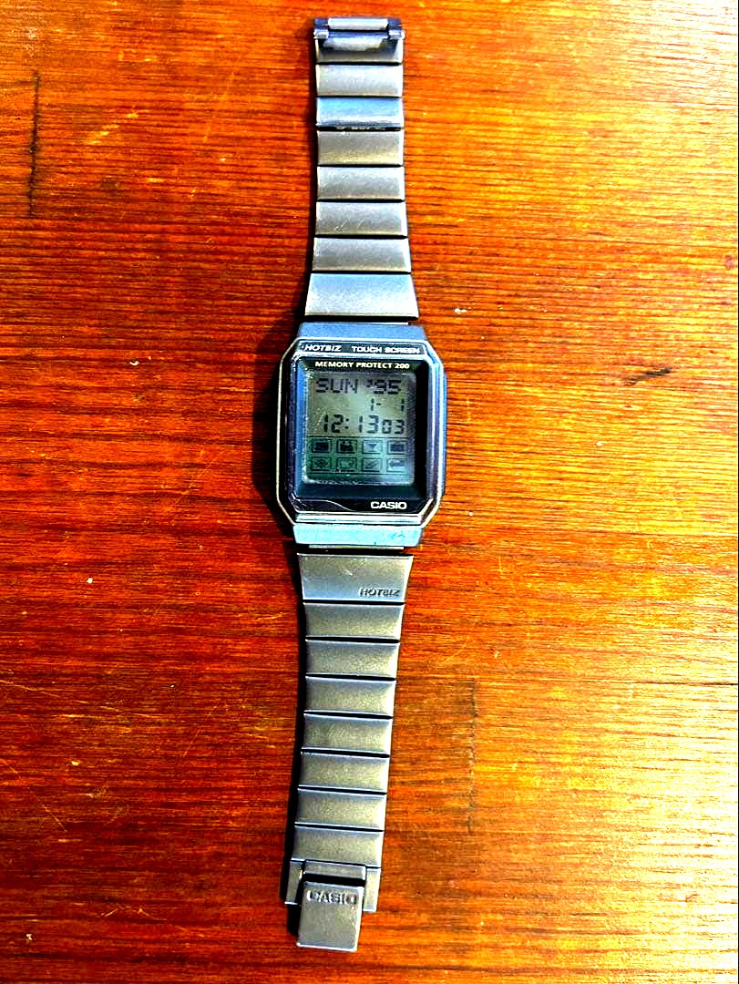 Casio Data Bank VDB-2000 vintage digital watch with touch screen and memory protect, showing front display