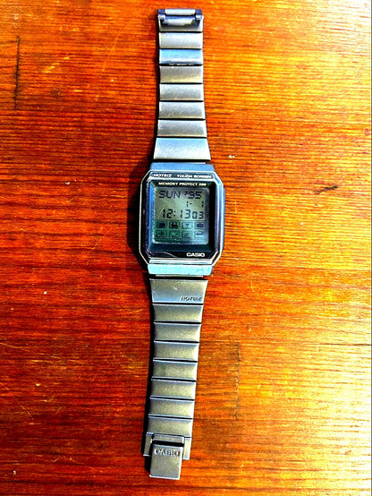 Casio Data Bank VDB-2000 vintage digital watch with touch screen and memory protect, showing front display