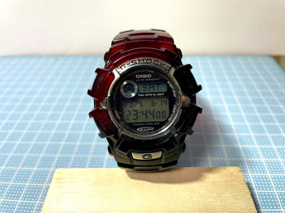 Casio G-Shock digital watch Model 2184 with black and red colors and digital display featuring touch solar function