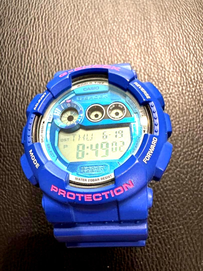 Casio G-Shock GD-120TS-2JF multi-color digital watch with metallic dial and LED backlight