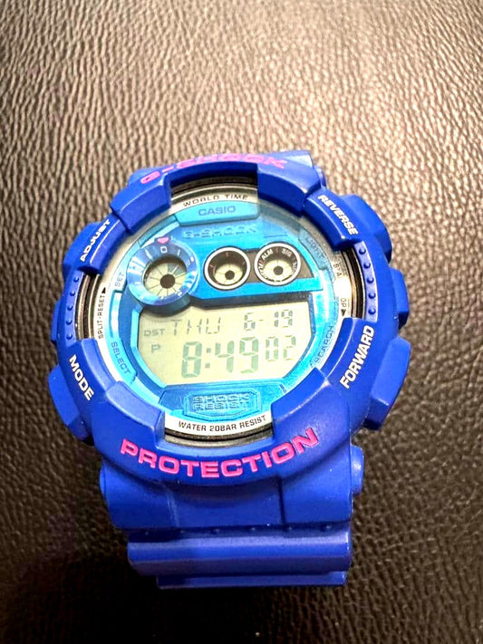 Casio G-Shock GD-120TS-2JF multi-color digital watch with metallic dial and LED backlight