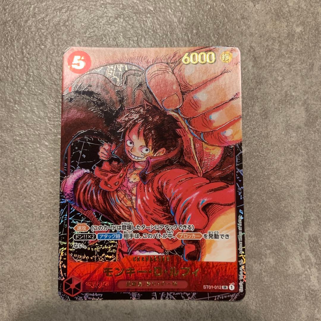 One Piece card featuring Monkey D. Luffy ST01-012 with 6000 power and red attribute, Japan import