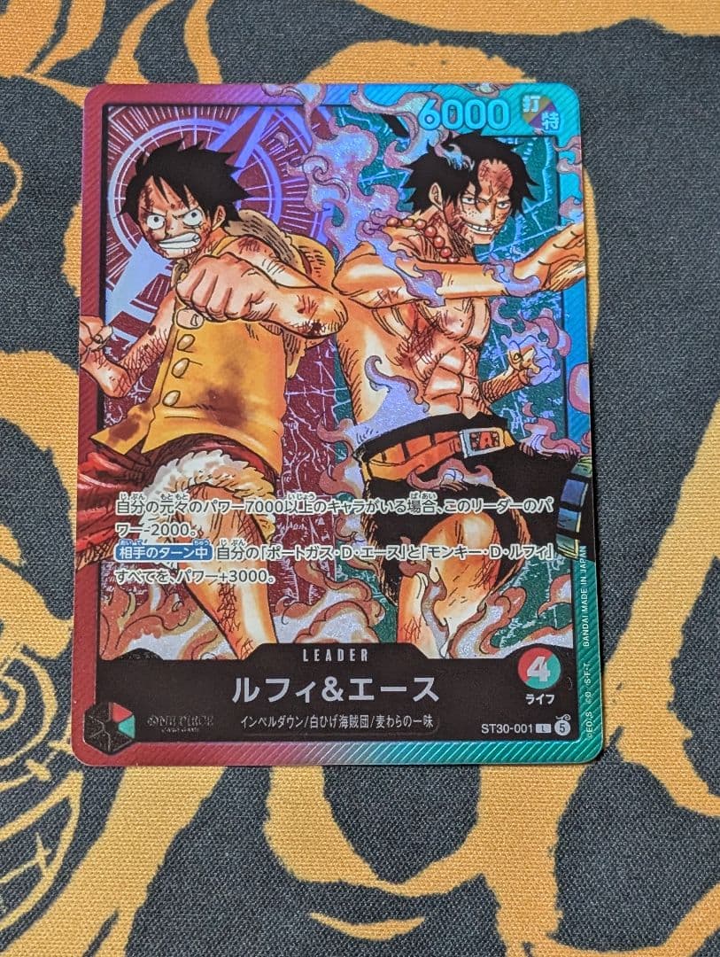 One Piece Start Deck EX Luffy and Ace leader cards ST30-001 displayed in protective sleeves