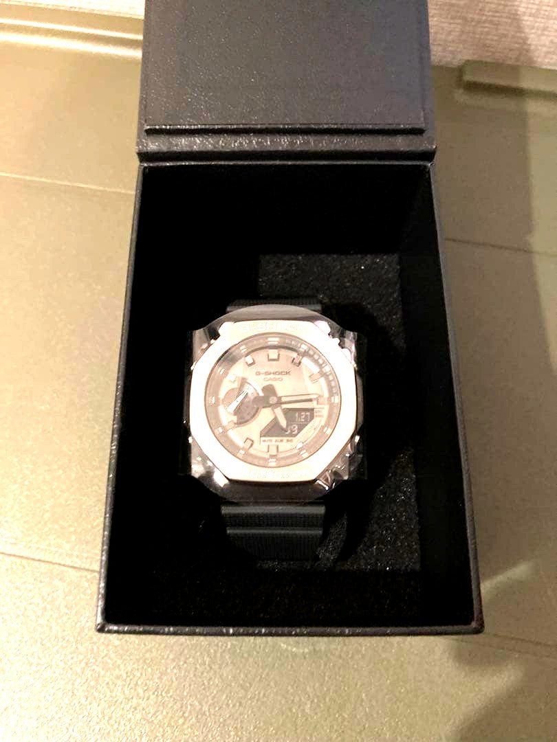 Casio G-Shock GM-2100-1JF watch with metal bezel, resin strap, black dial, and shock resistant design