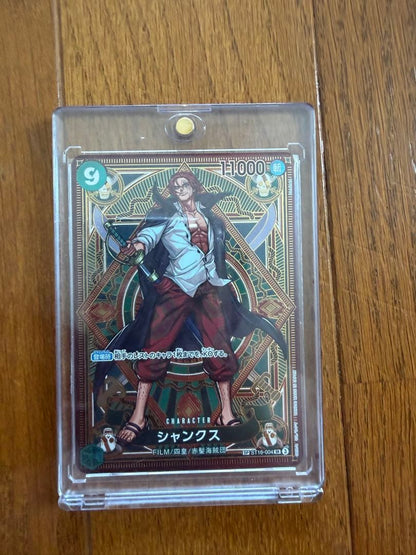 One Piece Shanks SP ST16-004 collectible card showing Shanks with Slash attribute and Four Emperors design