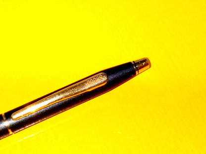 Cross Classic Century ballpoint pen in matte black with gold decoration and conical cap design